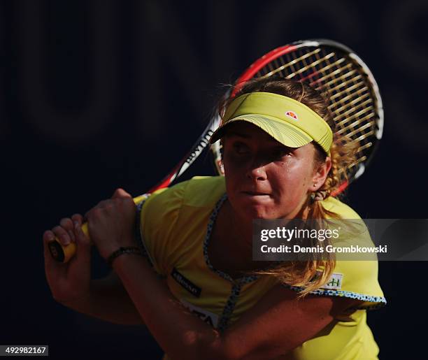 Elina Svitolina of Ukraine plays a backhand during her match against Mona Barthel of Germany during Day 6 of the Nuernberger Versicherungscup on May...