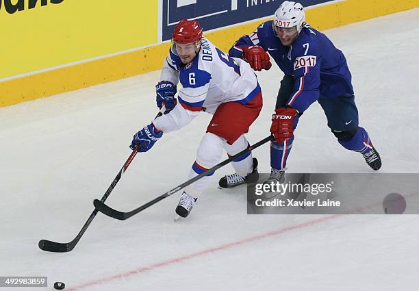 Denis Denisov of Russia and Yorick Treille of France in action during the 2014 IIHF World Championship between France and Russia - Quarter Final at...