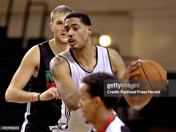 On Wednesday, November 14 Celtic Player Fab Melo looks for the open man during a scrimmage as he practices with the Red Claws at Portland Expo.