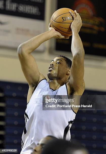 On Wednesday, November 14 Celtic Players Fab Melo takes a tall jumper from three-point territory during practice with the Red Claws at Portland Expo.