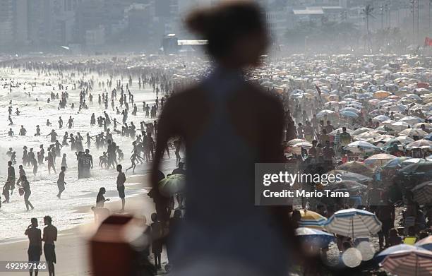 People jam Ipanema beach on the hottest day of the year so far on October 16, 2015 in Rio de Janeiro, Brazil. Temperatures peaked at 109 degrees in...