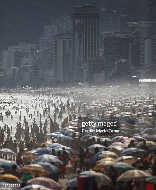 People jam Ipanema beach on the hottest day of the year so far on October 16, 2015 in Rio de Janeiro, Brazil. Temperatures peaked at 109 degrees in...