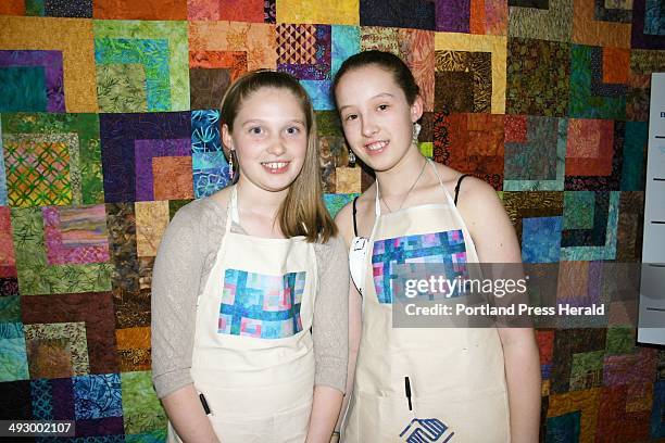 Boys & Girls Clubs CEO Robert Clark's daughters Alison and Elisabeth Clark took charge of the quilt raffle. Staff photo