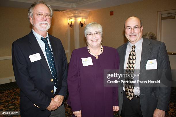 Don Burke, of Day One, Patricia Kimball, executive director of Wellspring, and Charlie Kimball. Staff photo