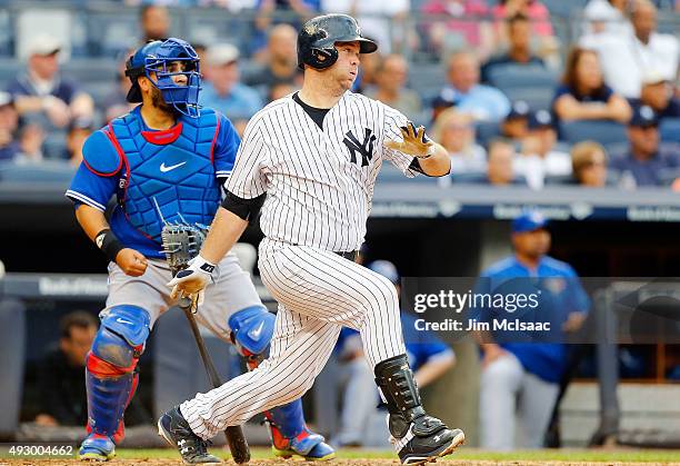 Brian McCann of the New York Yankees in action against the Toronto Blue Jays at Yankee Stadium on September 12, 2015 in the Bronx borough of New York...