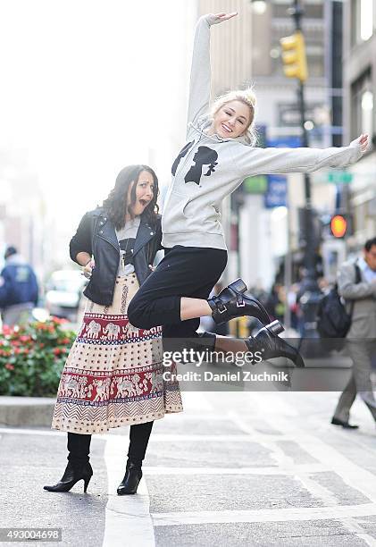 Chloe Lukasiak poses with Stacy Igel while visiting Stacy Igel at Boy Meets Girl on October 16, 2015 in New York City.