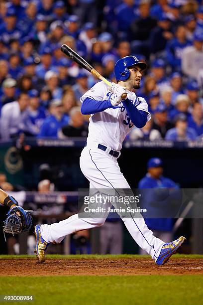 Eric Hosmer of the Kansas City Royals hits an RBI double in the eighth inning against the Toronto Blue Jays during game one of the American League...