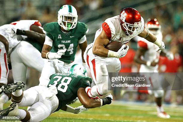 Kenneth Farrow of the Houston Cougars rushes the ball against the Tulane Green Wave at Yulman Stadium on October 16, 2015 in New Orleans, Louisiana.