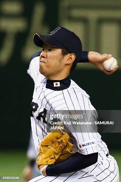 Yuki Nishi pitches during the game three of Samurai Japan and MLB All Stars at Tokyo Dome on November 15, 2014 in Tokyo, Japan.