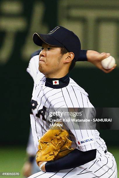 Yuki Nishi pitches during the game three of Samurai Japan and MLB All Stars at Tokyo Dome on November 15, 2014 in Tokyo, Japan.