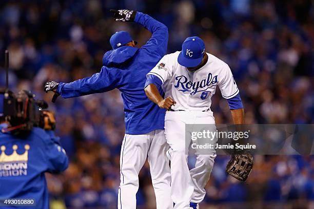 Lorenzo Cain of the Kansas City Royals celebrates with Jarrod Dyson of the Kansas City Royals after defeating the Toronto Blue Jays 5-0 in game one...