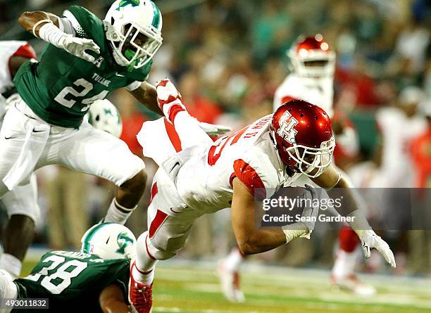 Kenneth Farrow of the Houston Cougars rushes the ball against the Tulane Green Wave at Yulman Stadium on October 16, 2015 in New Orleans, Louisiana.