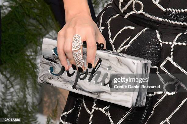 Sophia Bush, clutch detail, attends UNICEF Neverland Masquerade Ball at Moonlight Studios on October 16, 2015 in Chicago, Illinois.