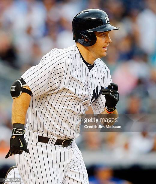 Dustin Ackley of the New York Yankees in action against the Toronto Blue Jays at Yankee Stadium on September 12, 2015 in the Bronx borough of New...