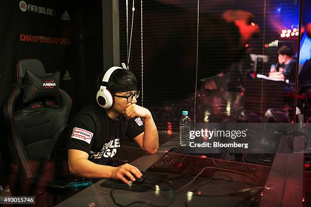 Yang Jin Hyeob, a professional video-game player, competes against Jeong Se Hyun, not pictured, during the final round of the Electronic Arts Inc....