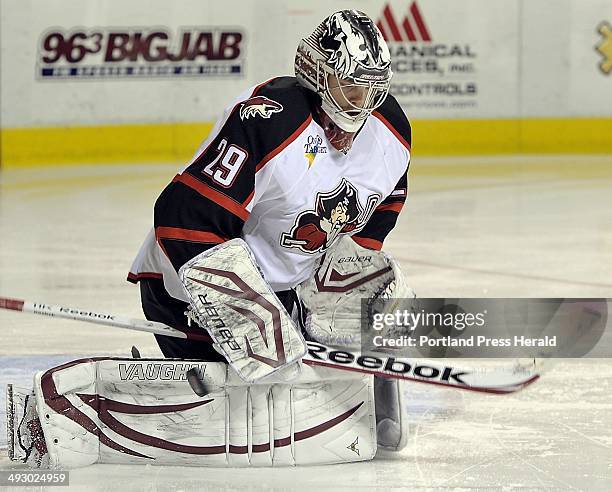 On Wednesday, January 2 Portland goalie, #29, Mark Visentin blocks a shot on goal with his pads as The Portland Pirates hosts the Providence Bruins...