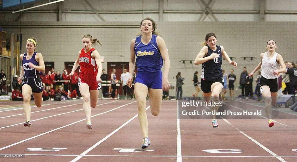 Kate Hall of Lake Region wins the 55-meter dash final at the Class B Maine Indoor Track State Meet a