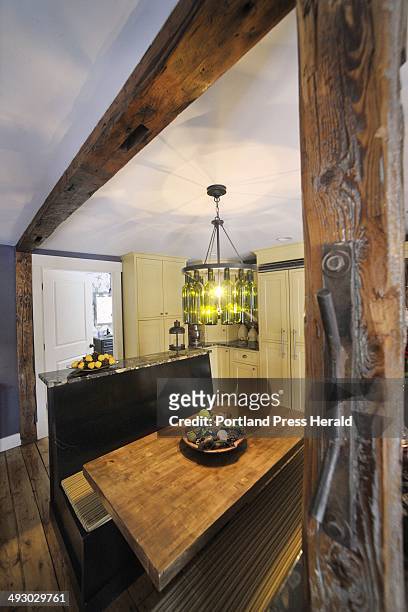 Wednesday, February 15, 2012 -- Tina Richardson's remodeled kitchen in the barn of an 1800's farmhouse in Westbrook. Many of the old barn's beams and...