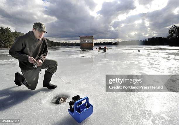 Thurs. , Feb. 23, 2012. Sanford HS senior Jeff Lemay is conducting a ice fishing project catching and tagging black crappie in Bauneg Beg Pond in...