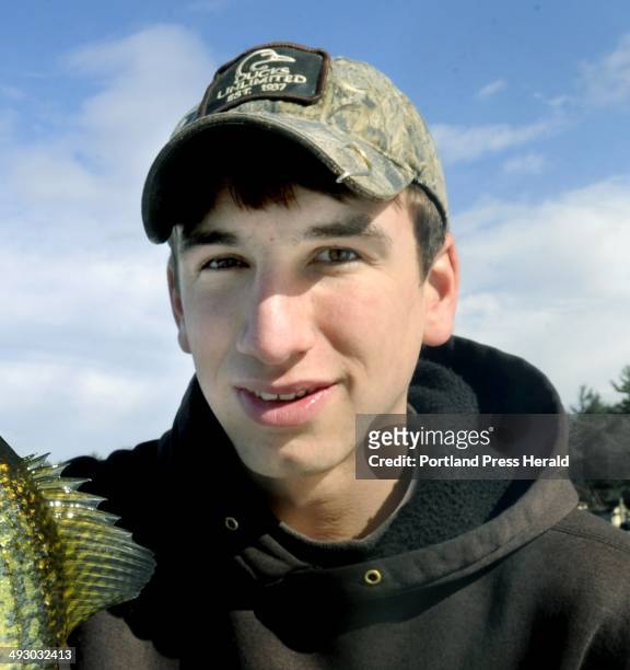 Thurs. , Feb. 23, 2012. Sanford HS senior Jeff Lemay is conducting a ice fishing project catching black crappie in Bauneg Beg Pond in South Sanford...