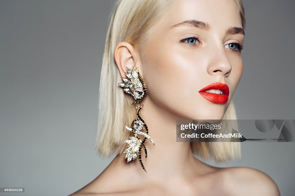 Portrait of a nice looking woman with beautiful earings