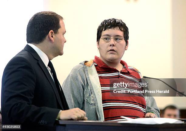 Attorney Curtis Rice stands with client James Reynolds during arraignment at Oxford County Superior Court in South Paris. Friday, December 13, 2013.