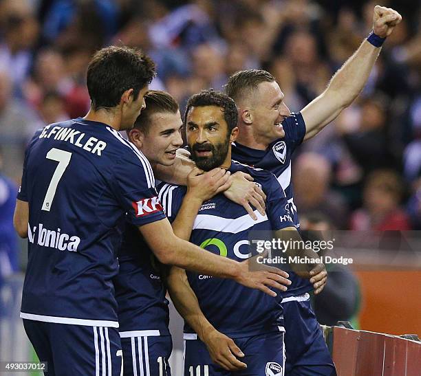 Ben Khalfallah of the Victory celebrates a goal with Besart Berisha during the round two A-League match between Melbourne Victory and Melbourne City...