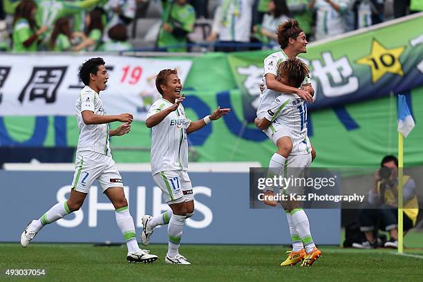 Daisuke Kikuchi of Shonan Bellmare celebrates scoring his team's second goal with his team mates Seiya Fujita , Yuto Misao and Shunsuke Kikuchi...