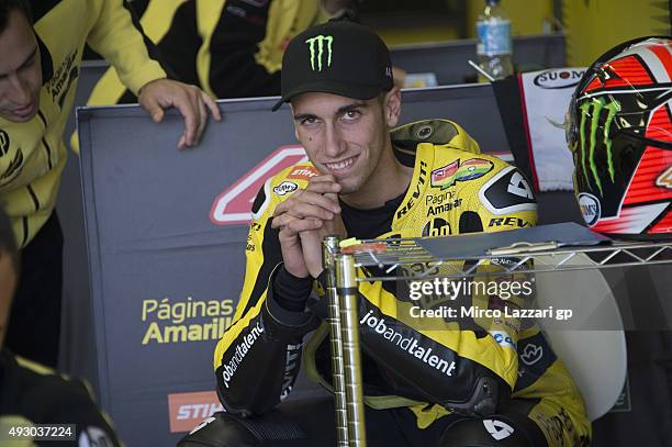 Alex Rins of Spain and Pagina Amarillas HP40 looks on in box before the qualifying practice during the MotoGP of Australia - Qualifying for the 2015...