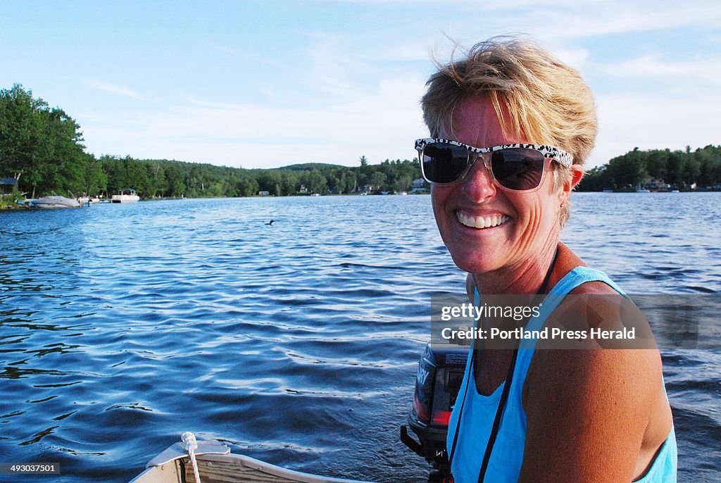 Jeri Kahl of Monmouth finds a loon during a 10-minute boat ride on Cobboseeconttee Lake, Saturday, J