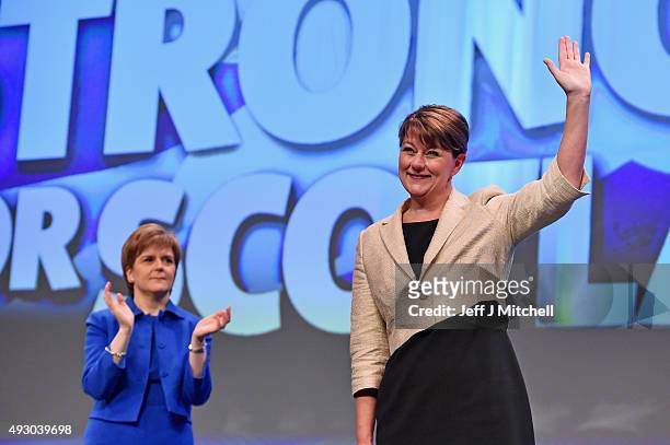 Leanne Wood , the Plaid Cymru leader acknowledges applause from Nicola Sturgeon following her address during the 81st annual SNP conference at the...