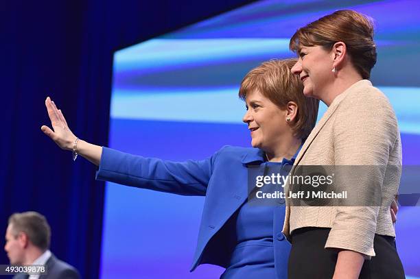 Leanne Wood, the Plaid Cymru leader acknowledges applause from Nicola Sturgeon following her address to the 81st annual SNP conference at the...