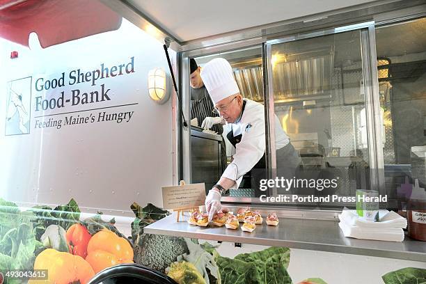 The Good Shepherd Food Bank in Auburn shows off its new food truck at its annual Humanitarian Award dinner Thursday April 4, 2013. Retired chair of...