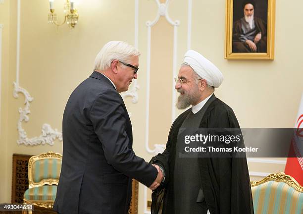 German Foreign Minister Frank-Walter Steinmeier meets with President of Iran, Hassan Rohani, on October 17, 2015 in Tehran, Iran. It is the first...