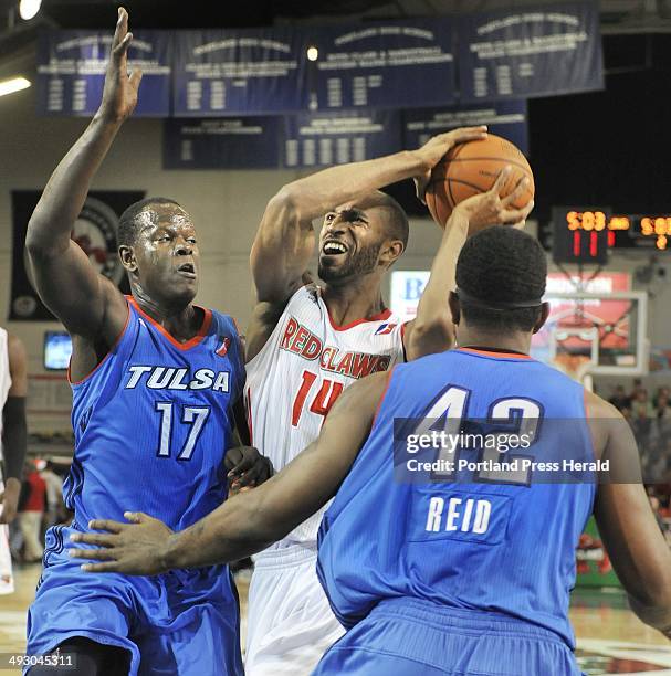 Friday, April6, 2012 -- Maine Red Claws vs. The Tulsa 66ers at the Portland Expo. Maine's Cedric Bozeman drives into the lane against Tulsa's, Robert...