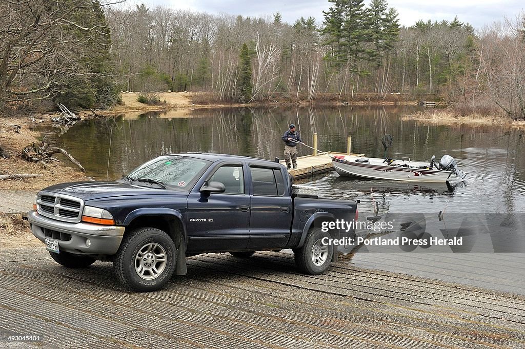 Sebago Lake public boat launch sites. Dan Hillier, of Naples, prepares to take out his boat at the b
