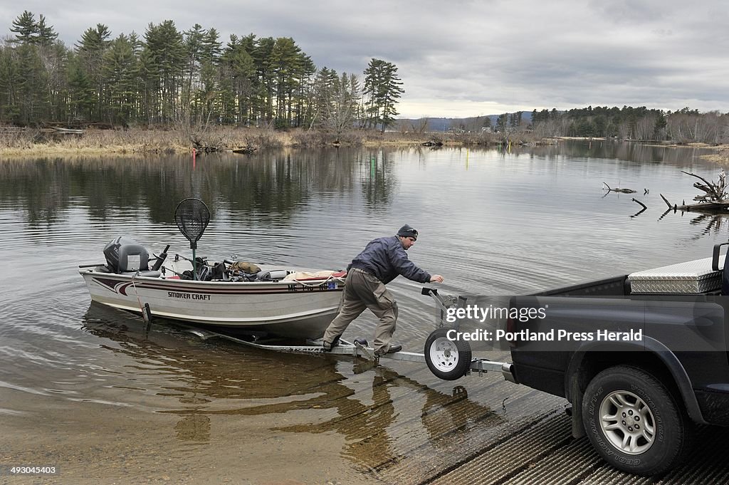 Sebago Lake public boat launch sites. Dan Hillier, of Naples, prepares to take out his boat at the b