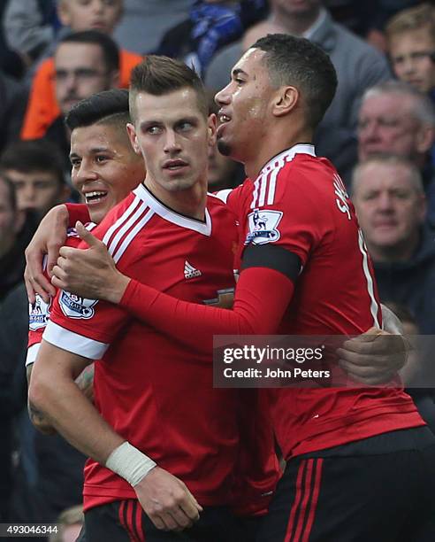 Morgan Schneiderlin of Manchester United celebrates scoring their first goal during the Barclays Premier League match between Everton and Manchester...