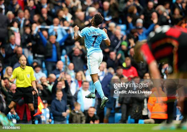 Raheem Sterling of Manchester City celebrates scoring his team's fourth and hat trick goal during the Barclays Premier League match between...