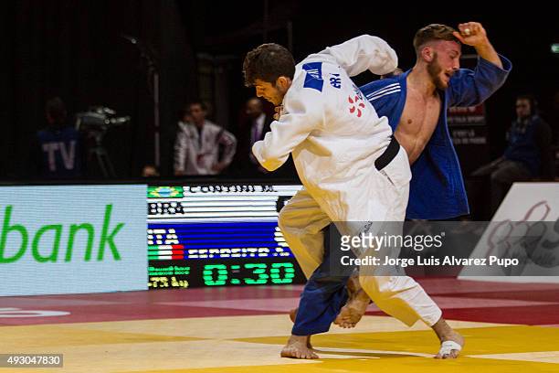 Marcelo Contini of Brazil competes against Antonio Esposito of Italy during the -73kg preliminary round of the Paris Grand Slam 2015 at the Palais...