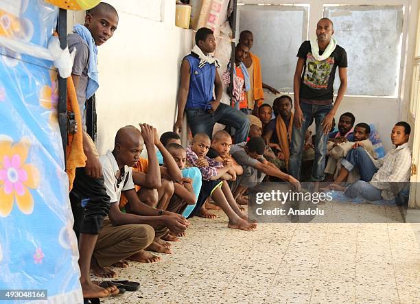 Refugees are seen at a makeshift detention center in the outskirts of Misrata, Libya on October 16, 2015. Approximately 1.500 refugees from Egypt,...