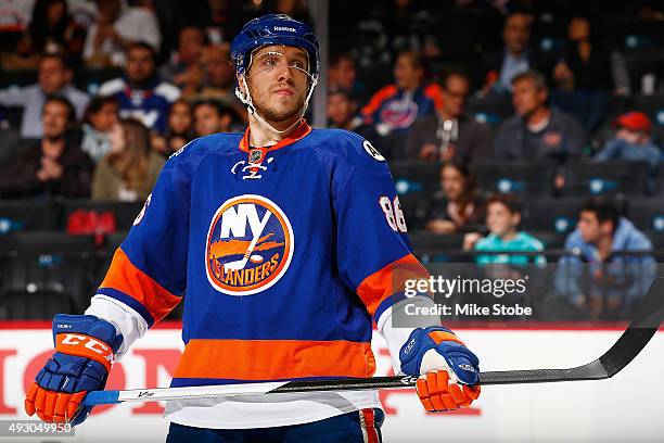Nikolay Kulemin of the New York Islanders skates against the Nashville Predators at the Barclays Center on October 15, 2015 in Brooklyn borough of...