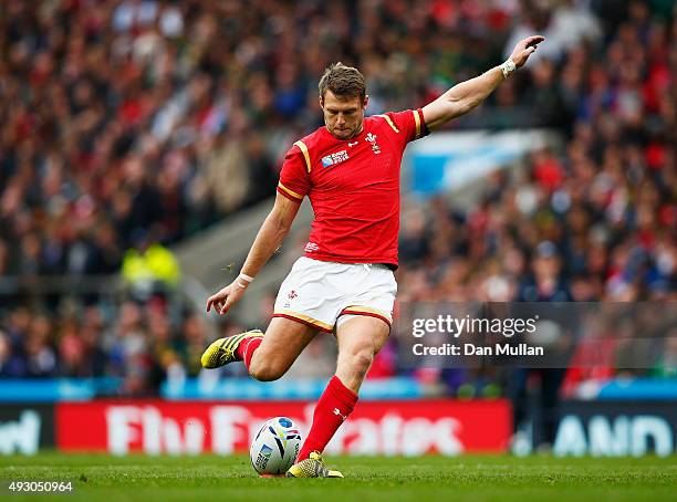 Dan Biggar of Wales kicks a penalty during the 2015 Rugby World Cup Quarter Final match between South Africa and Wales at Twickenham Stadium on...