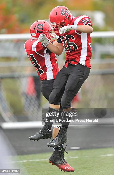 October 5, 2013ë¦?Scarborough vs. Biddeford football game played at Scarborough. Scarborough's, Brendan Smith, and, Dan LeClair, celebrate Smith's...