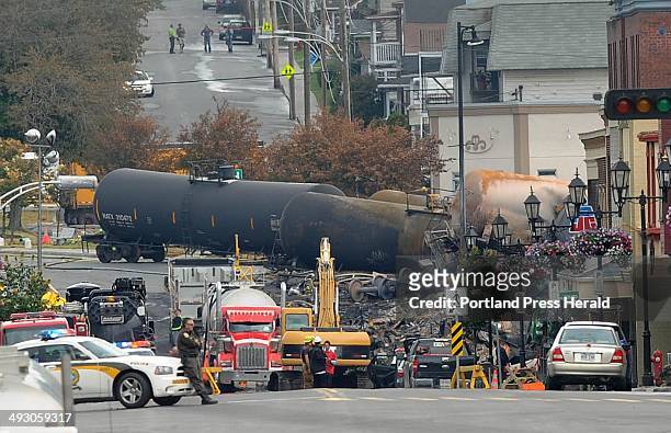 Crude oil tankers from the Montreal, Maine & Atlantic railways are seen in the heart of downtown Lac-Megantic, Quebec where the runaway train...