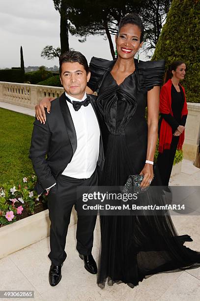 Oscar Generale and Denny Mendez attend amfAR's 21st Cinema Against AIDS Gala presented by WORLDVIEW, BOLD FILMS, and BVLGARI at Hotel du Cap-Eden-Roc...