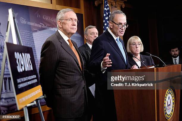 Sen. Charles Schumer , center, with Sen. Harry Reid , from left, Sen. Richard Durbin , and Sen. Patty Murray hold a press conference to urge the...