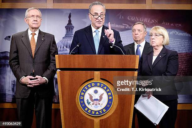 Sen. Charles Schumer , center, with Sen. Harry Reid , left, Sen. Patty Murray , from right, and Sen. Richard Durbin hold a press conference to urge...