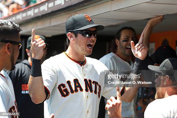 Tyler Colvin of the San Francisco Giants and Hunter Pence stand in the dugout before the game against the Atlanta Braves at AT&T Park on May 14, 2014...