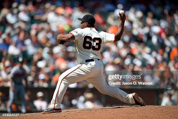 Jean Machi of the San Francisco Giants pitches against the Atlanta Braves during the seventh inning at AT&T Park on May 14, 2014 in San Francisco,...